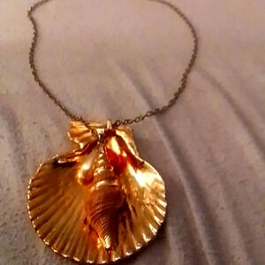 Gold plated clam shell statement piece